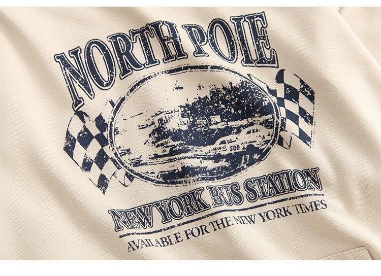 A stylish couple wearing a retro letter print patchwork color hoodie, showcasing a casual autumn streetwear look.