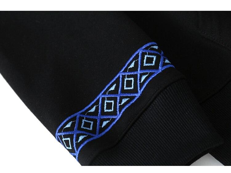 Men's vintage graphic letter embroidery hoodie in black and white, showcasing a stylish pullover design perfect for autumn and winter.