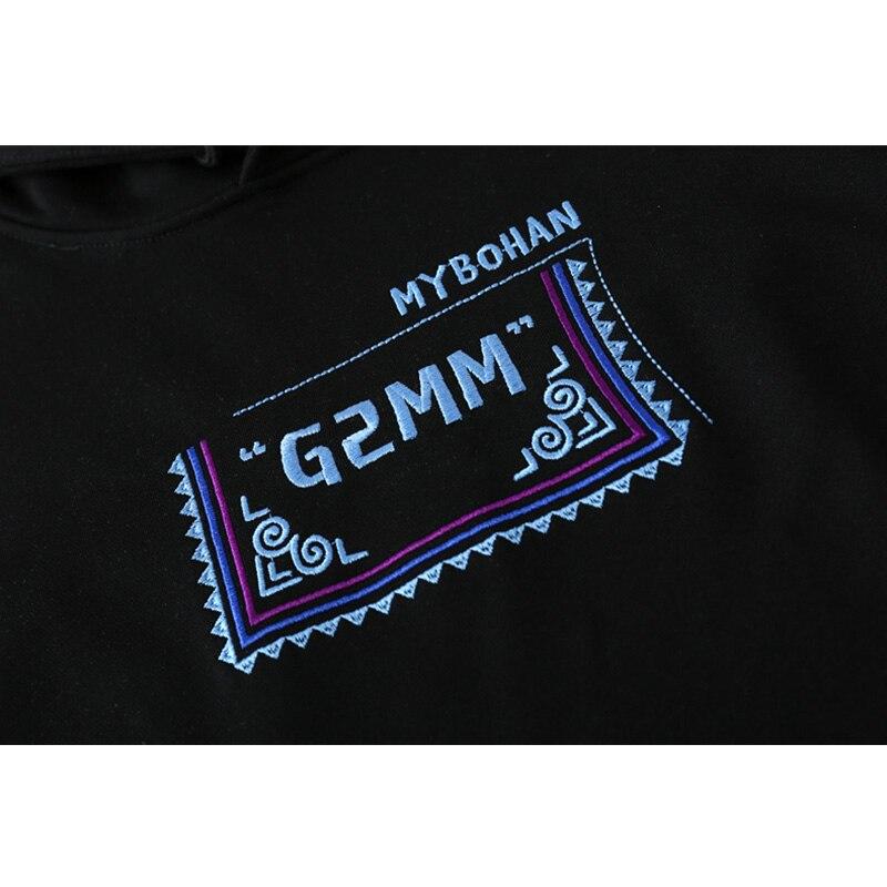 Men's vintage graphic letter embroidery hoodie in black and white, showcasing a stylish pullover design perfect for autumn and winter.