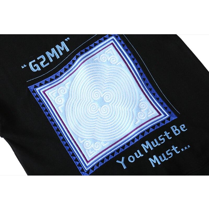 Men's vintage graphic letter embroidery hoodie in black and white, showcasing a stylish pullover design perfect for autumn and winter.