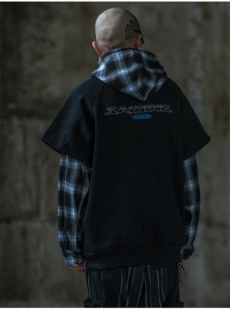 Men's oversized hooded pullover featuring plaid print sleeves in black and yellow, perfect for streetwear style.
