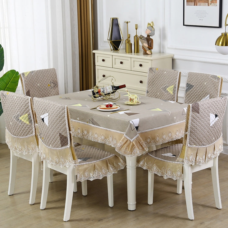 Elegant home dining table and chair non-slip cover with embroidered lace, enhancing dining aesthetics and functionality.