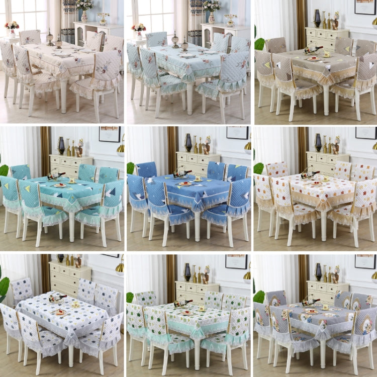 Elegant home dining table and chair non-slip cover with embroidered lace, enhancing dining aesthetics and functionality.