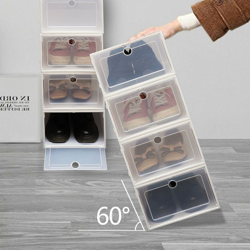 A stack of transparent plastic shoe boxes, showcasing their foldable and stackable design, ideal for organizing footwear.