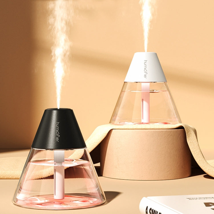 Household Desktop Mini Volcano Humidifier in white, showcasing its compact design and mist output.
