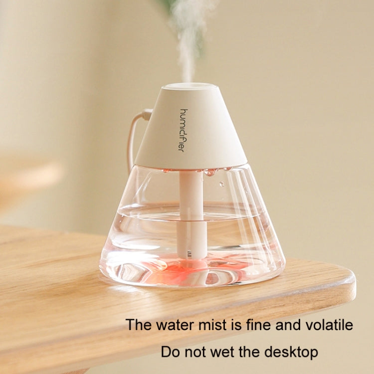 Household Desktop Mini Volcano Humidifier in white, showcasing its compact design and mist output.