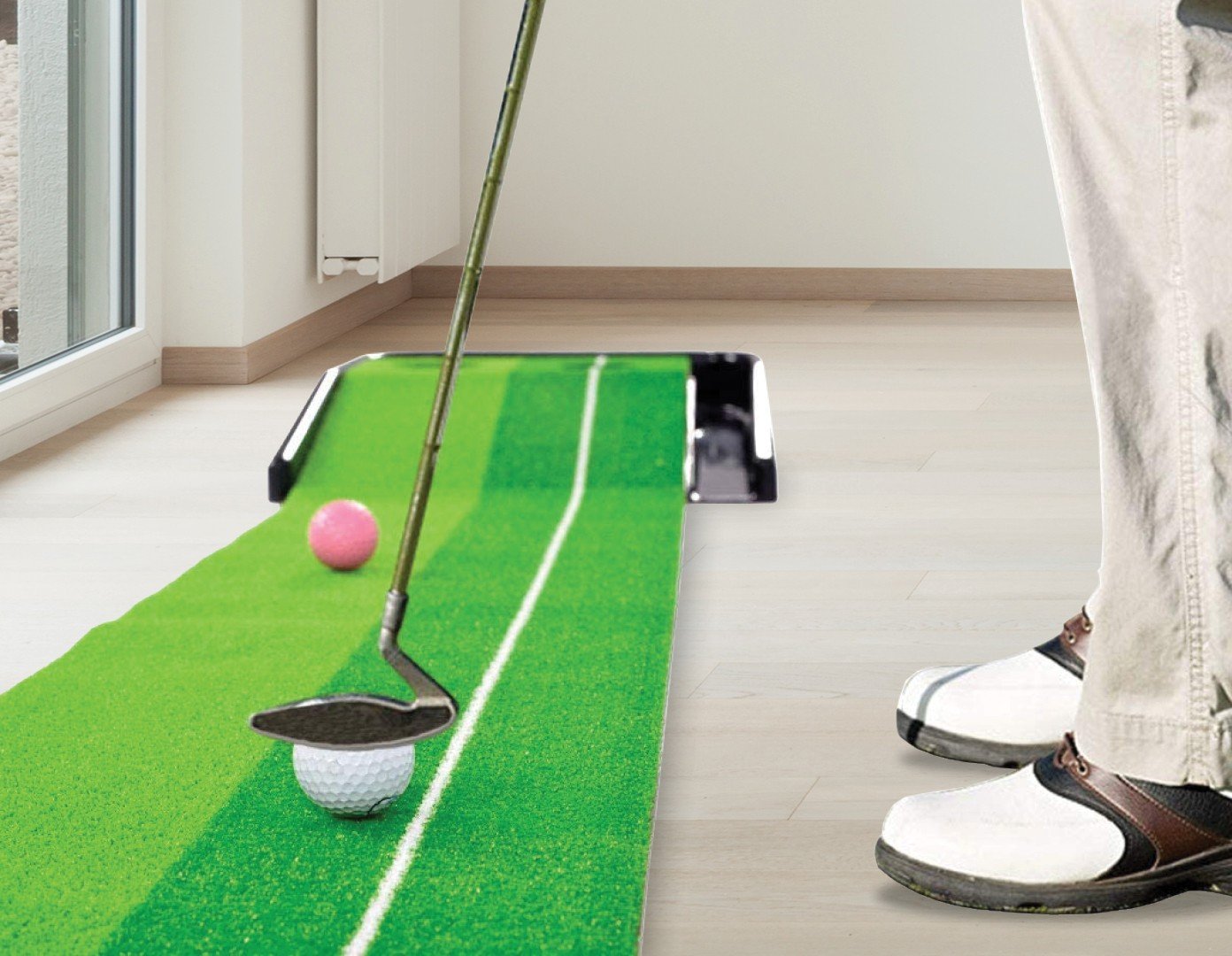 Indoor Practice Putting Green 2.5m Mat with inclined ball return and two holes, designed for indoor and outdoor use.