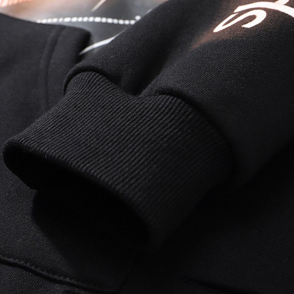 Injured Punk Comics Girl Letter Print Tearing Hoodie in black, showcasing a unique cartoon design and hooded style, perfect for streetwear fashion.