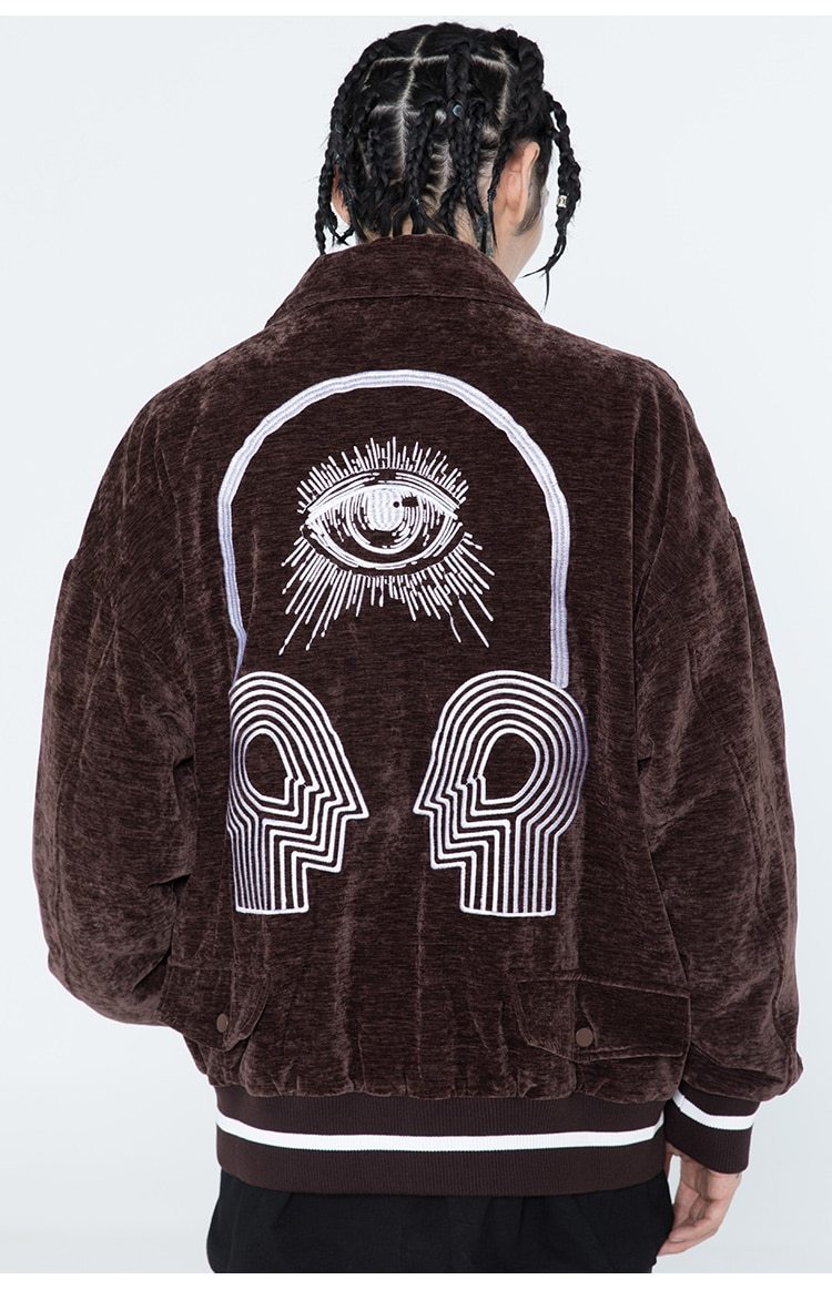 Men's bomber jacket featuring eye embroidery and letter design, available in black, brown, and dark green.