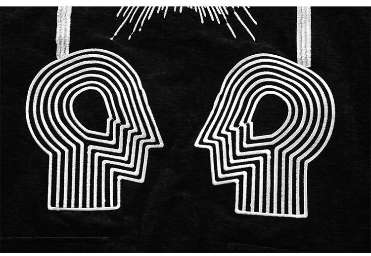 Men's bomber jacket featuring eye embroidery and letter design, available in black, brown, and dark green.