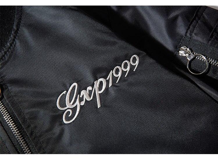 Men's thick tracksuit jacket featuring Chinese embroidery, zipper closure, and stand collar in black color.