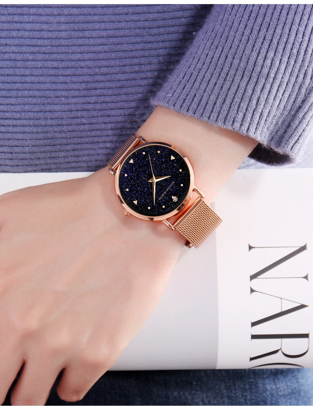 Golden ladies wristwatch featuring a stainless steel mesh band and Japan quartz movement, showcasing a stylish design with a starry night face.