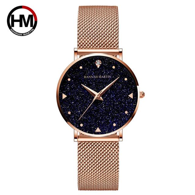 Golden ladies wristwatch featuring a stainless steel mesh band and Japan quartz movement, showcasing a stylish design with a starry night face.