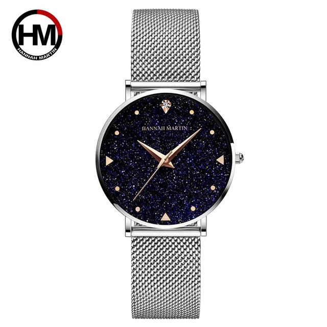 Golden ladies wristwatch featuring a stainless steel mesh band and Japan quartz movement, showcasing a stylish design with a starry night face.
