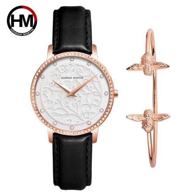 Japan Quartz Waterproof Sculpture Emboss White Flower bracelet watch for women, featuring a white flower design, stainless steel band, and elegant round case.