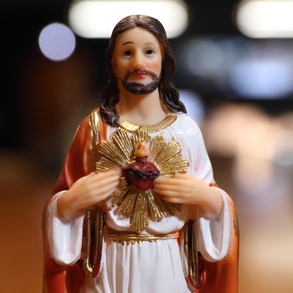 Detailed Jesus Statue Sacred Heart Figure made of resin, showcasing intricate features and a serene expression, perfect for religious decor.
