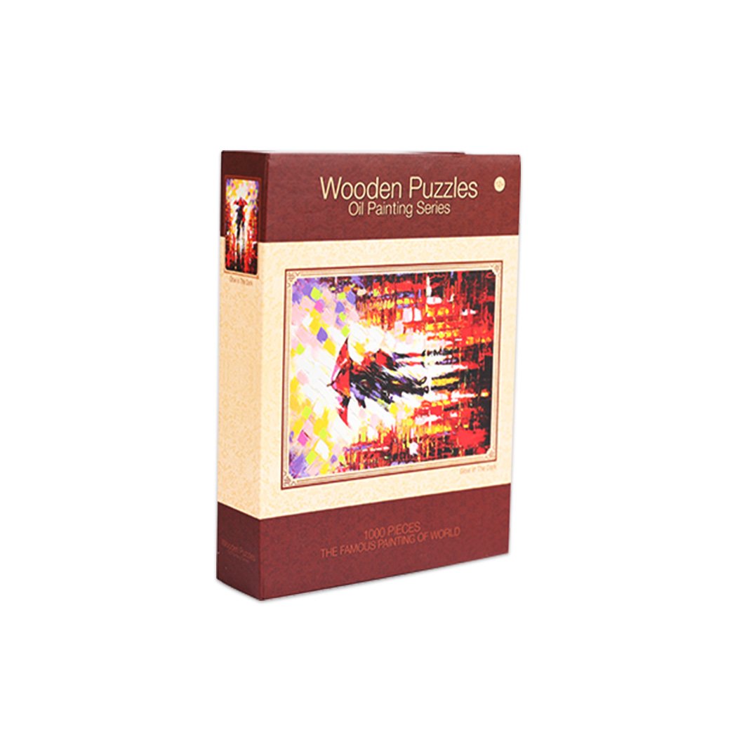 A colorful 1000-piece jigsaw puzzle made of basswood, showcasing a vibrant design with pieces scattered around, highlighting its glow-in-the-dark feature.