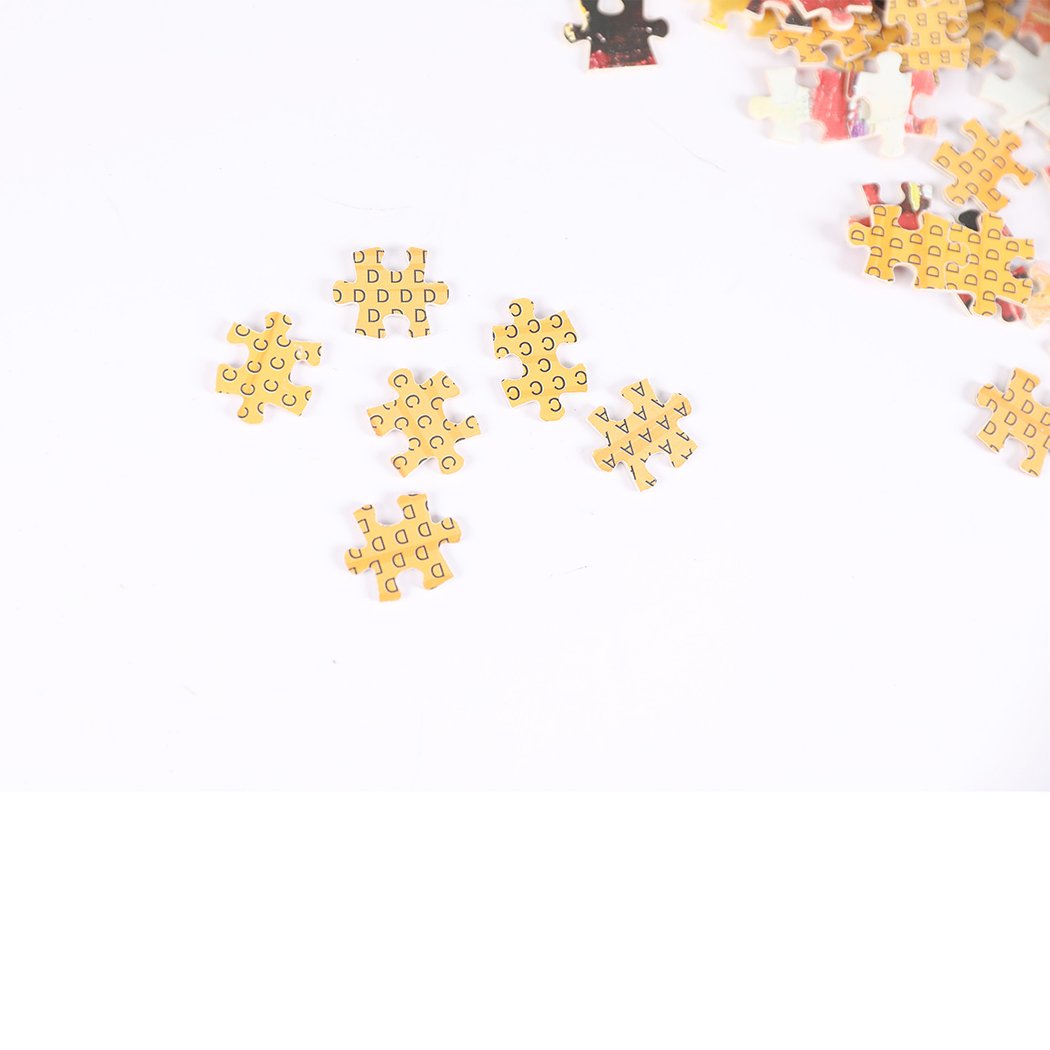 A colorful 1000-piece jigsaw puzzle made of basswood, showcasing a vibrant design with pieces scattered around, highlighting its glow-in-the-dark feature.