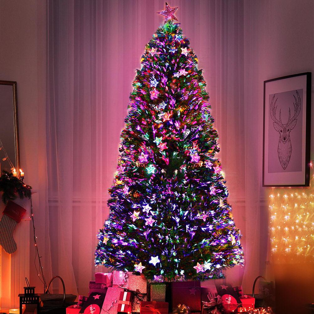 Jingle Jollys 1.8M LED Christmas Tree with colorful optic fiber stars and a bright LED top star, showcasing a lush and realistic design.