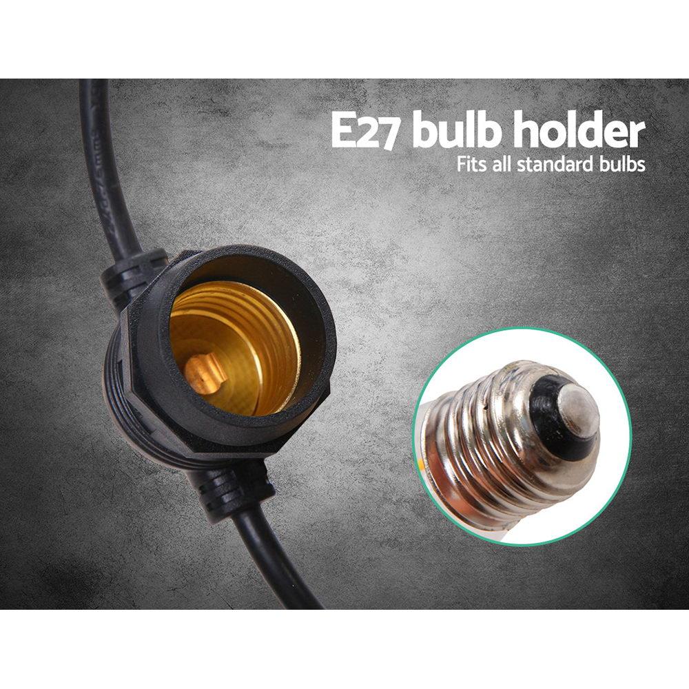 Jingle Jollys 65m Festoon String Lights with warm glowing bulbs, perfect for outdoor and indoor celebrations.