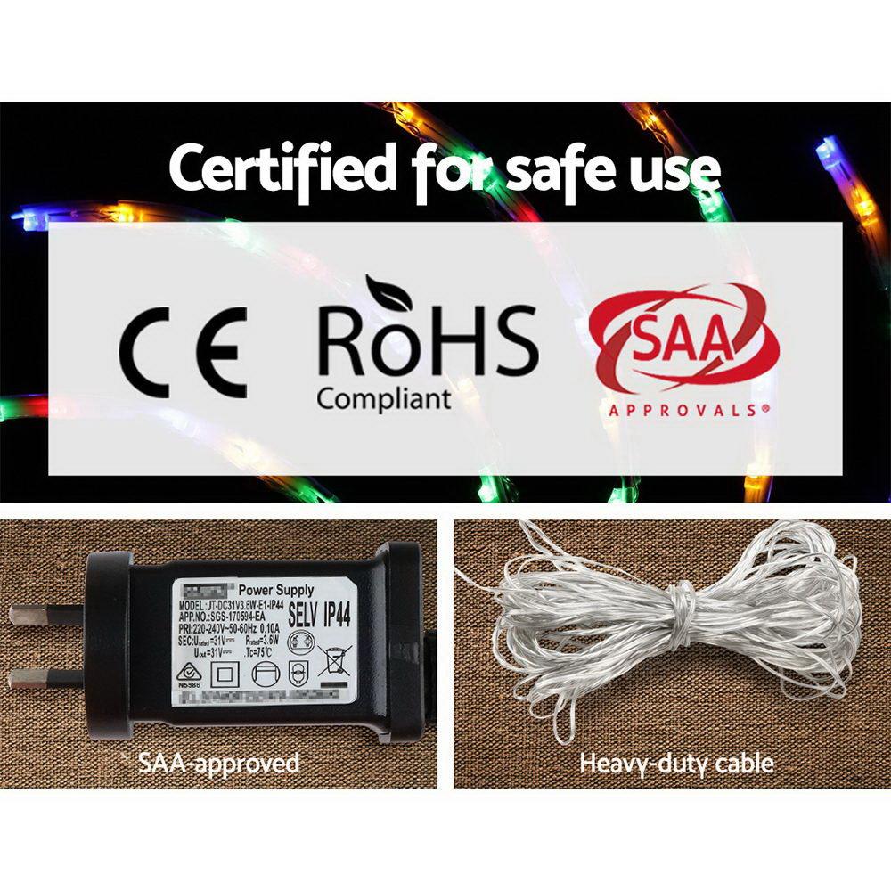 Jingle Jollys LED Spinner Light with 128 colorful bulbs in a sturdy white metal frame, spinning in festive motion.