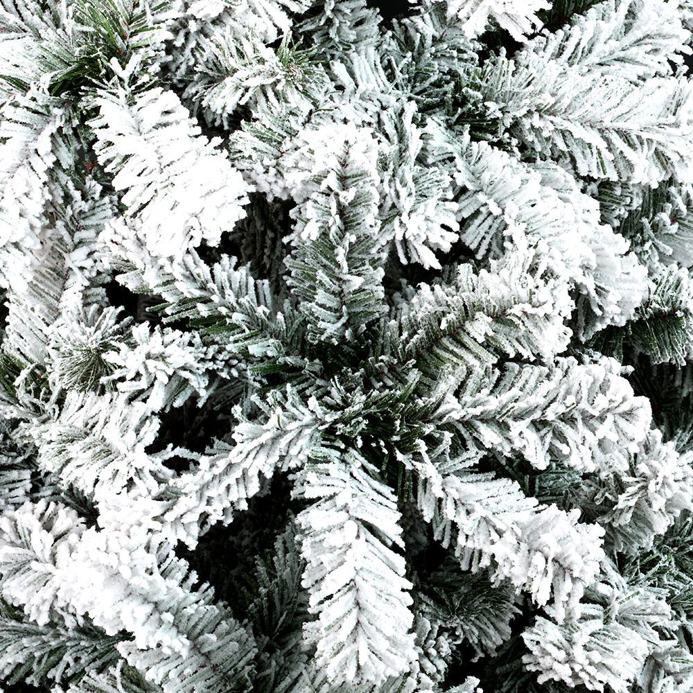 Jingle Jollys Snowy Christmas Tree standing 2.4m tall with snow-sprayed tips, showcasing a lush and realistic appearance.