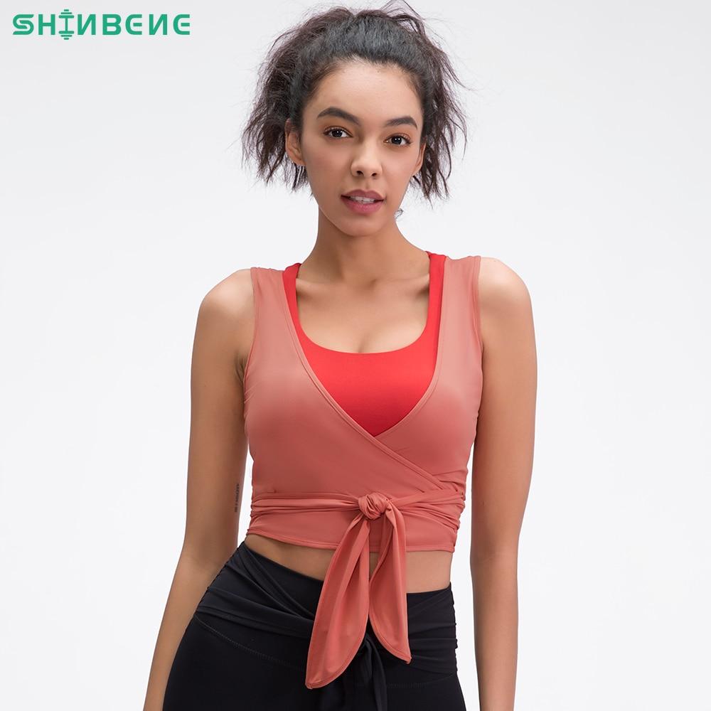 A stylish lightweight dance gym tank top for women featuring a V-neck design, made from soft nylon and spandex, ideal for workouts and yoga.