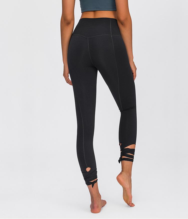 JUST A TIE Naked Feel Yoga Dancer Capri Pants for women, featuring 4-way stretch, inner pocket, and calf-length design in a stylish athletic look.