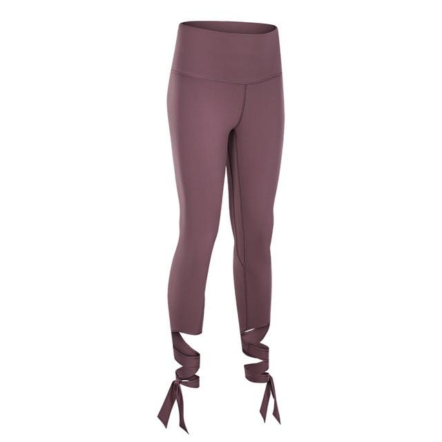 JUST A TIE Naked Feel Yoga Dancer Capri Pants for women, featuring 4-way stretch, inner pocket, and calf-length design in a stylish athletic look.