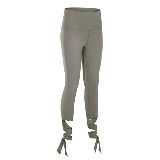 JUST A TIE Naked Feel Yoga Dancer Capri Pants for women, featuring 4-way stretch, inner pocket, and calf-length design in a stylish athletic look.