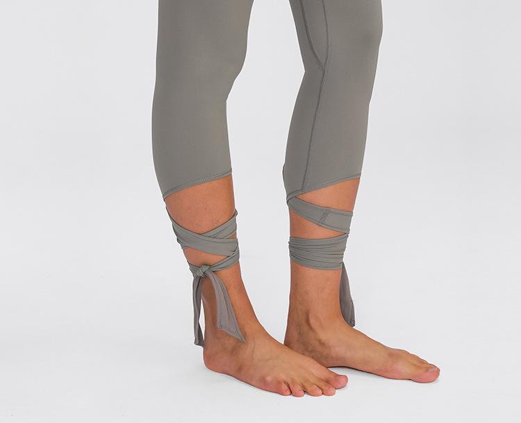 JUST A TIE Naked Feel Yoga Dancer Capri Pants for women, featuring 4-way stretch, inner pocket, and calf-length design in a stylish athletic look.