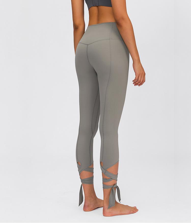 JUST A TIE Naked Feel Yoga Dancer Capri Pants for women, featuring 4-way stretch, inner pocket, and calf-length design in a stylish athletic look.