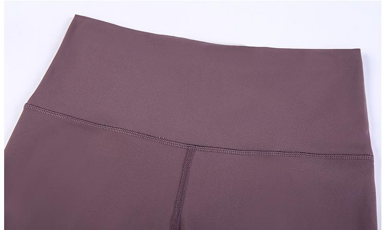 JUST A TIE Naked Feel Yoga Dancer Capri Pants for women, featuring 4-way stretch, inner pocket, and calf-length design in a stylish athletic look.