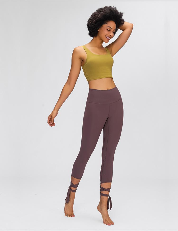 JUST A TIE Naked Feel Yoga Dancer Capri Pants for women, featuring 4-way stretch, inner pocket, and calf-length design in a stylish athletic look.