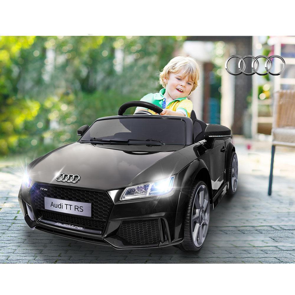 Kids Ride On Audi TT RS car in black, featuring stylish design, working doors, and dynamic headlights, perfect for young drivers.