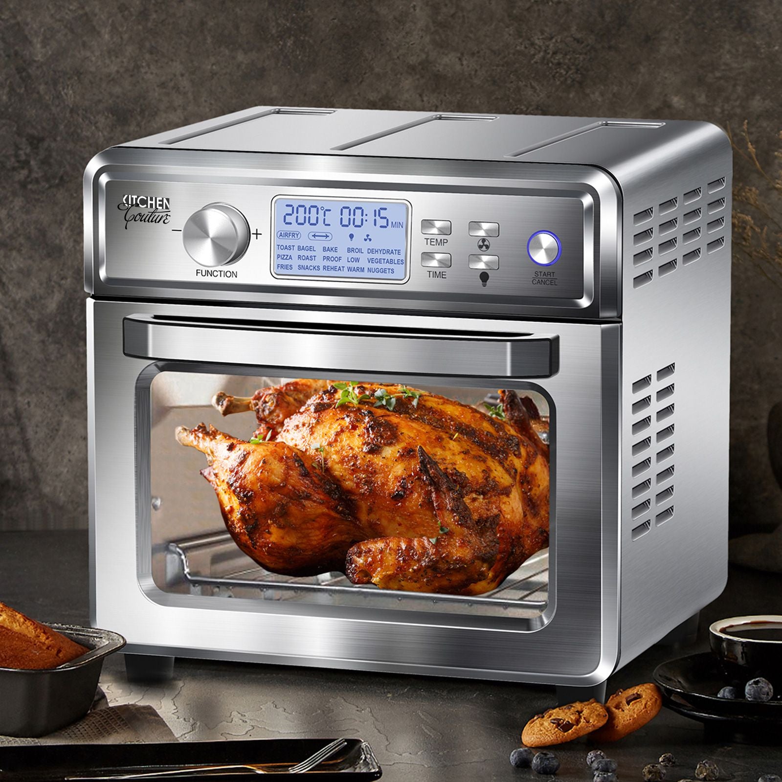 Kitchen Couture 24 Litre Air Fryer with LCD display and stainless steel design, showcasing its large capacity and included accessories.