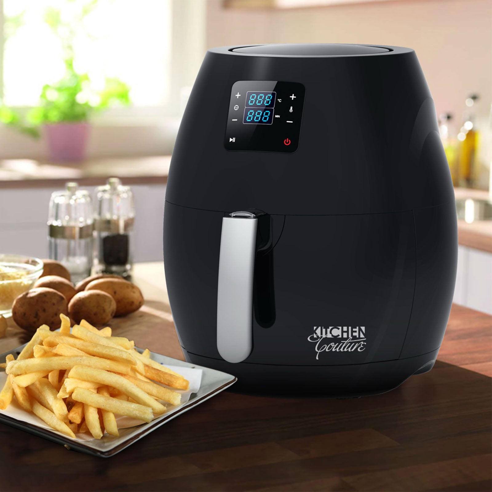 Kitchen Couture 7L Digital Air Fryer in sleek black design with a futuristic touch screen, perfect for healthy oil-free cooking.