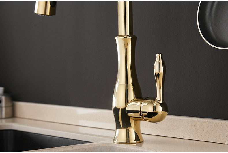Black single handle pull out kitchen faucet with 360-degree swivel and brass construction, designed for modern kitchens.