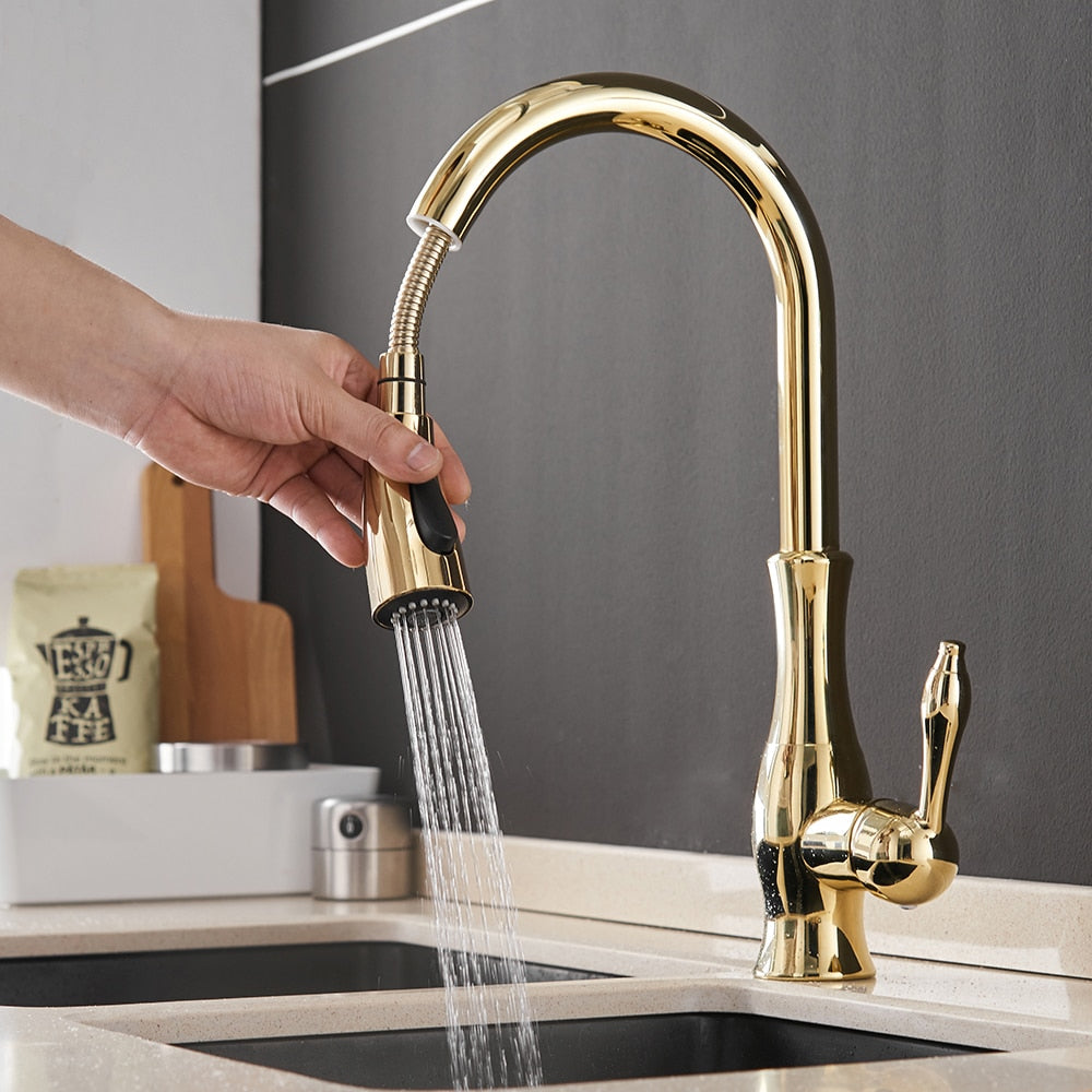 Black single handle pull out kitchen faucet with 360-degree swivel and brass construction, designed for modern kitchens.