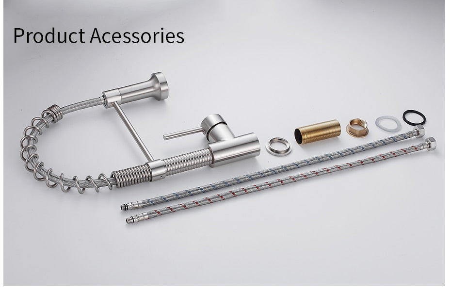 Brushed nickel kitchen faucet with pull-down spray head, showcasing a sleek and modern design suitable for any kitchen decor.