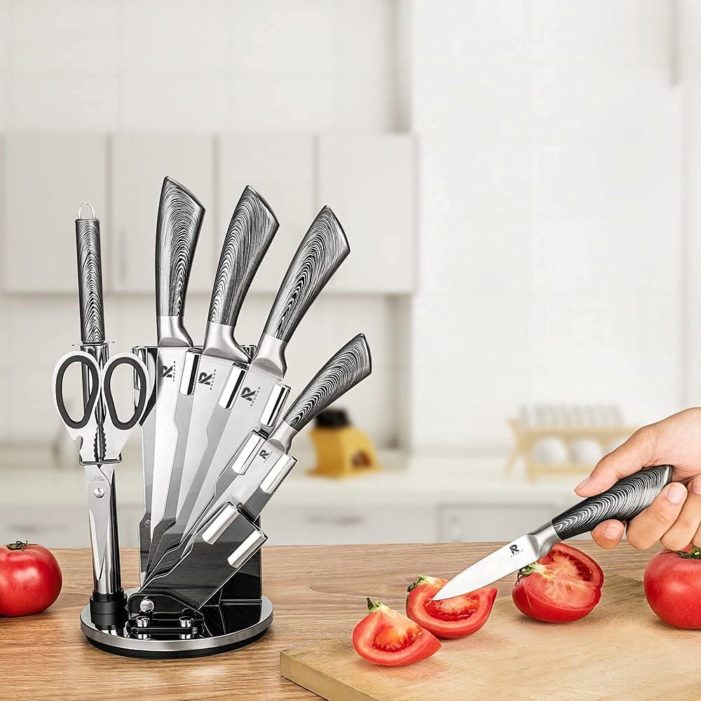 Kitchen Knife Block Set featuring 8 stainless steel knives with wooden color handles, displayed in a rotating acrylic knife block.