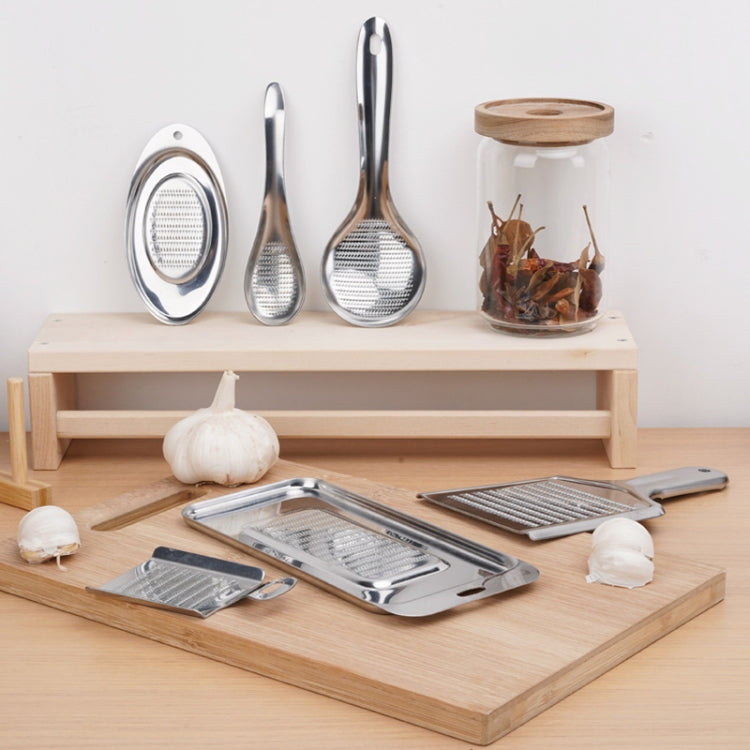 KS1001 Thicken Stainless Steel Ginger Garlic Vegetable Puree Grinder with sharp grinding teeth and concave design for efficient food preparation.