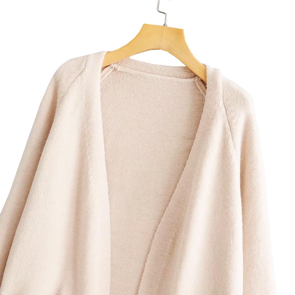 A stylish Lazy V-neck Oversize Long Sweater Cardigan in a solid color, featuring a relaxed fit and pockets, perfect for casual wear.