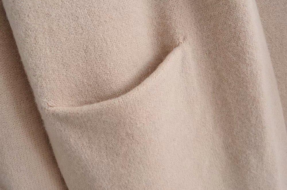 A stylish Lazy V-neck Oversize Long Sweater Cardigan in a solid color, featuring a relaxed fit and pockets, perfect for casual wear.