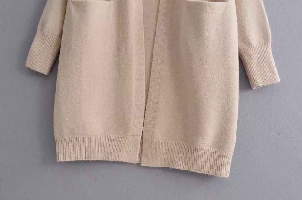 A stylish Lazy V-neck Oversize Long Sweater Cardigan in a solid color, featuring a relaxed fit and pockets, perfect for casual wear.