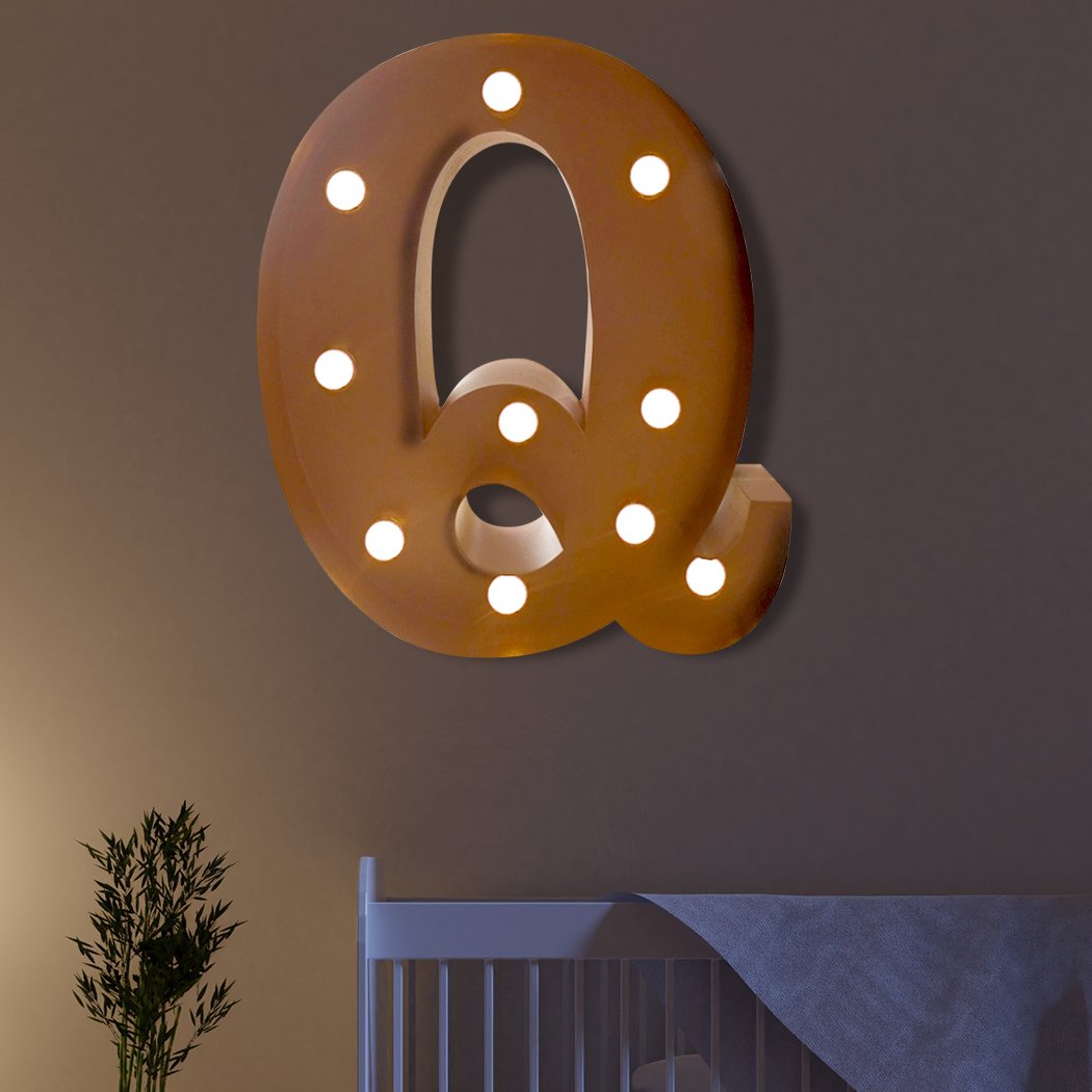 LED Metal Letter Lights in a festive setting, showcasing personalized letters glowing warmly.