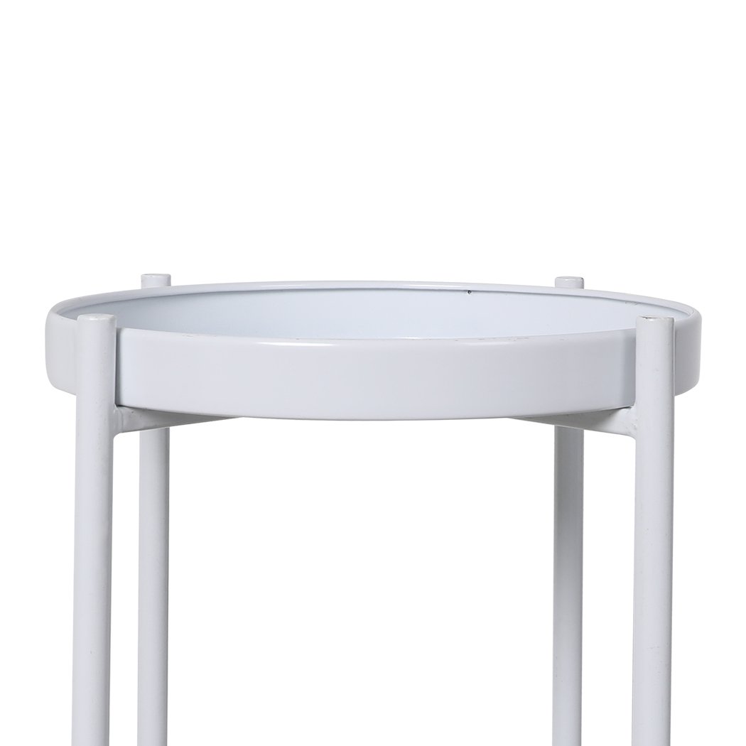 Levede 2 Tiers Plant Stand showcasing multiple flower pots in a garden setting, featuring a sleek white metal design.