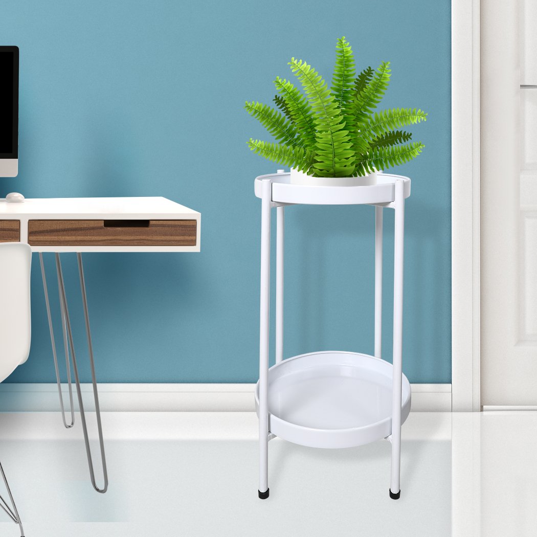 Levede 2 Tiers Plant Stand showcasing multiple flower pots in a garden setting, featuring a sleek white metal design.