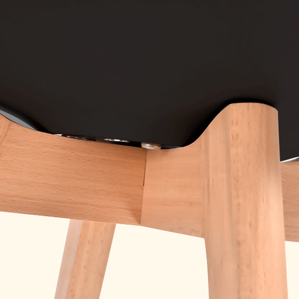 Levede 4x Retro Replica PU Leather Dining Chairs in black with wooden legs, showcasing minimalist design and premium quality.