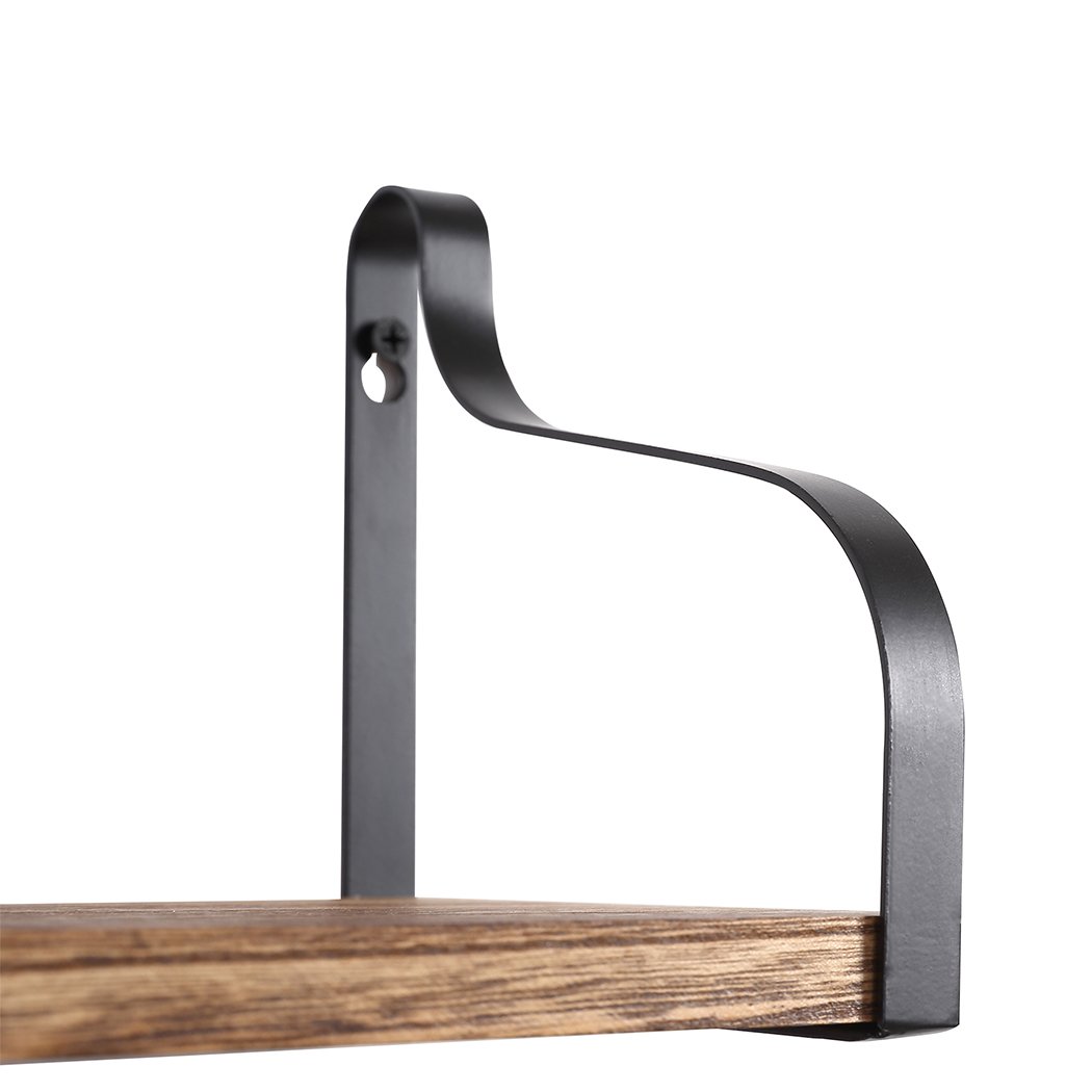 Levede Floating Shelf Brackets showcasing three wooden shelves mounted on a wall, displaying decorative items and plants.